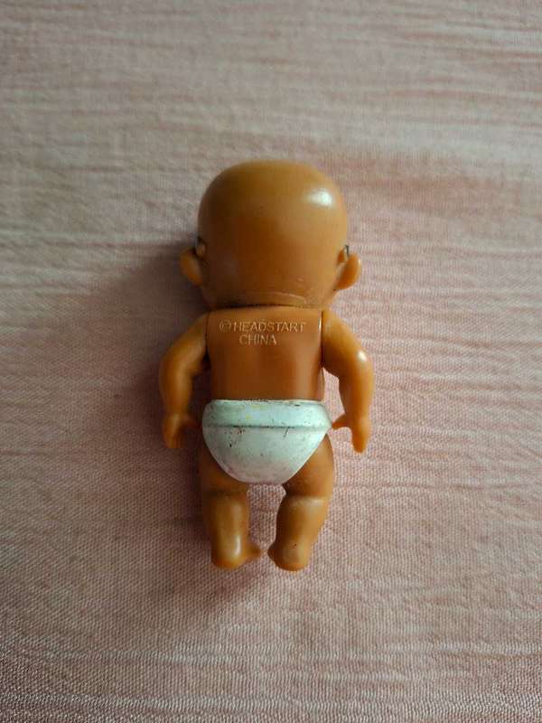 Headstart Baby Secrets doll with glasses