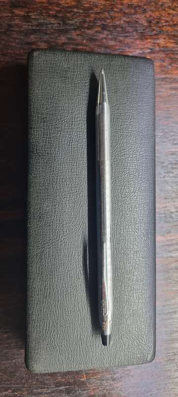 Silver Cross Pen.