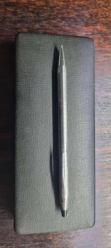 Silver Cross Pen.