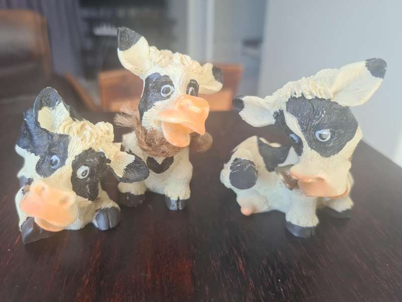 Black and White Cow figurines
