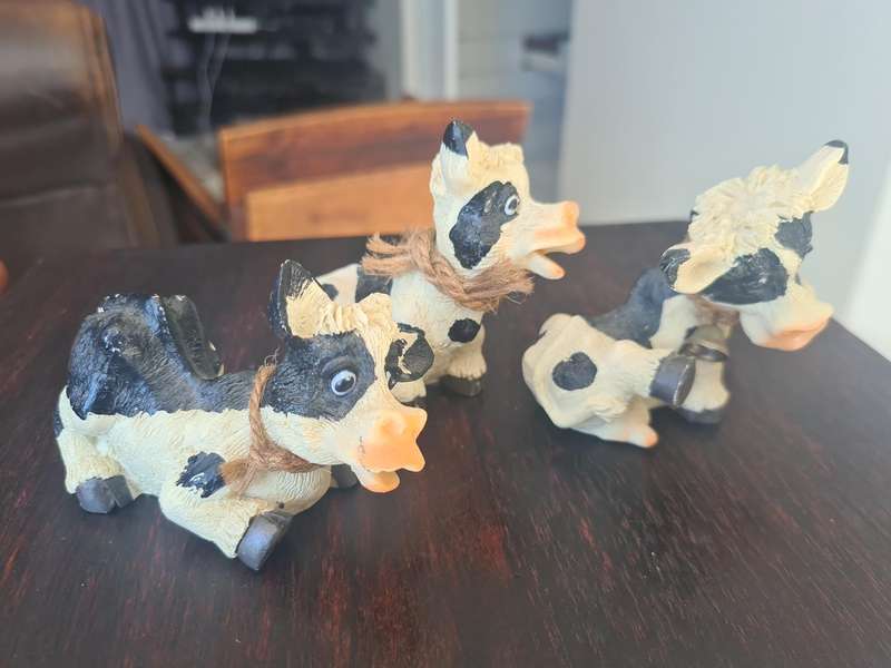 Black and White Cow figurines
