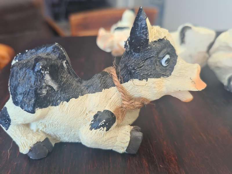 Black and White Cow figurines