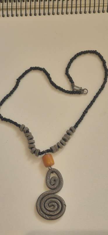 Artisan Bead Necklace and Swirls Solid Metal Pendant