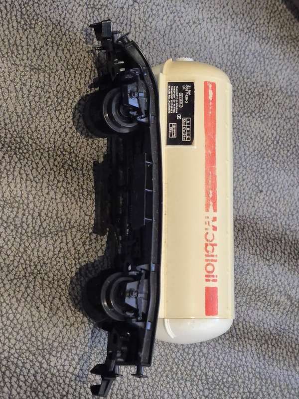 Toy Train Set. Locomotive with motor, 3 cars, and  14 tracks. Vintage British