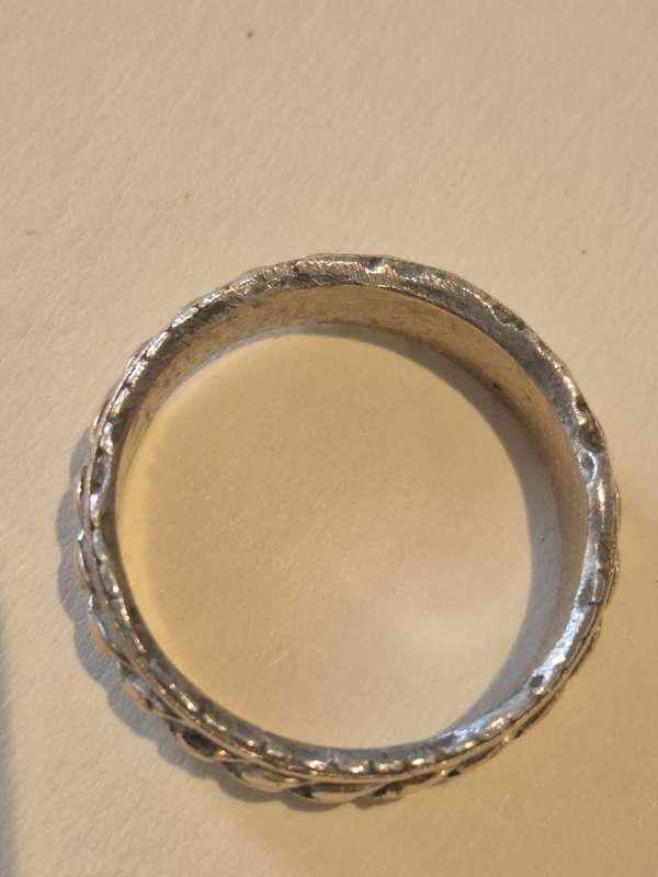 Hand finished chain design smooth irregular edge man ring. Comfort fit.