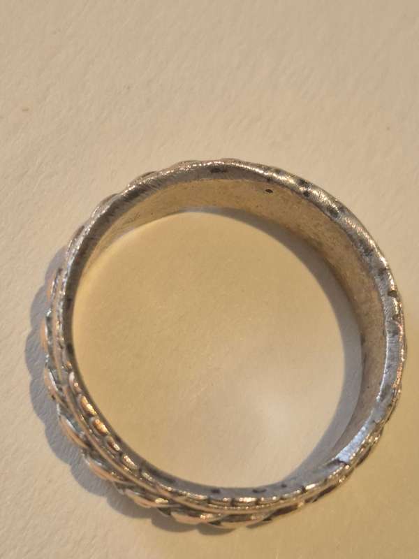 Hand finished chain design smooth irregular edge man ring. Comfort fit.