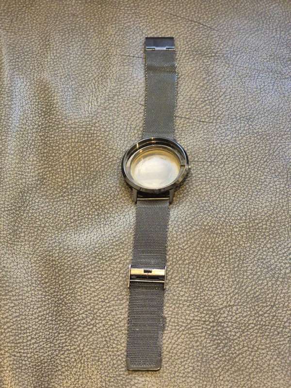 Black All Stainless Steel Mesh Strap, Working, and Black Stainless Steel Watch Case.
