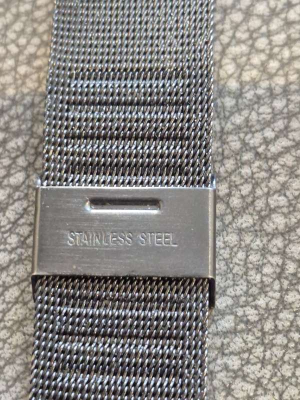 Black All Stainless Steel Mesh Strap, Working, and Black Stainless Steel Watch Case.