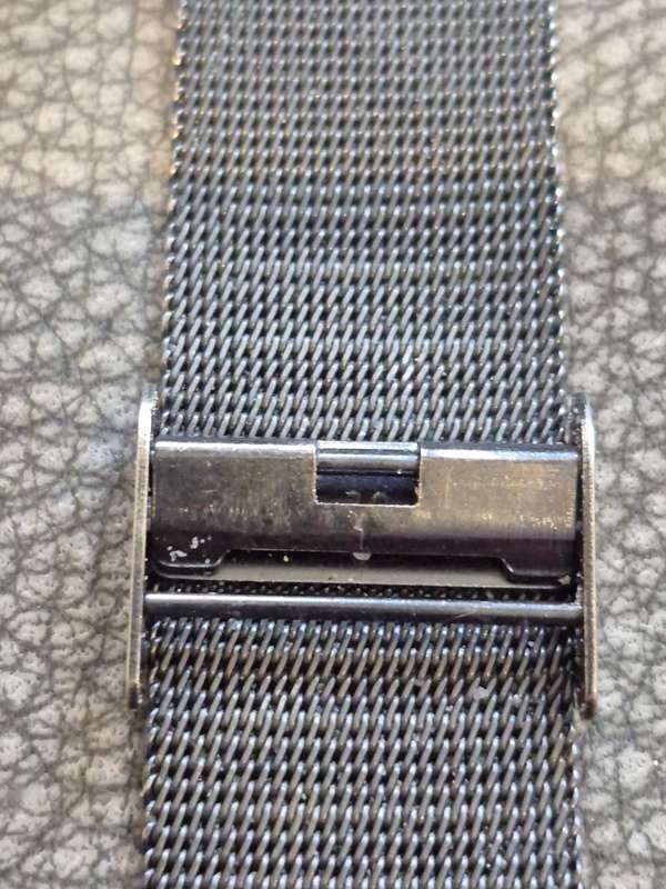 Black All Stainless Steel Mesh Strap, Working, and Black Stainless Steel Watch Case.