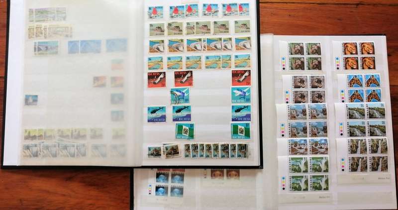 Later Rhodesia in 16 Pg album & Zimbabwe collection in 32 Pg - 2 second hand albums - not all shown