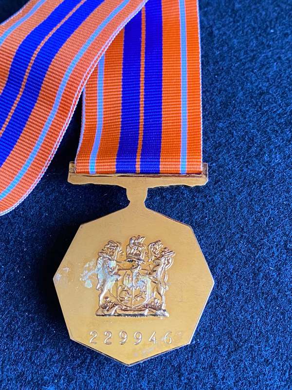 FULL SIZE PRO PATRIA MEDAL 1974-1990-LUCITE COATED-FIXED SUSPENDER-NUMBERED