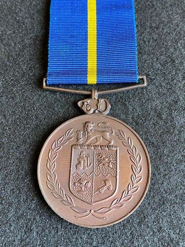 FULL SIZE POLICE 10 YEAR SERVICE MEDAL-NAMED ON THE RIM