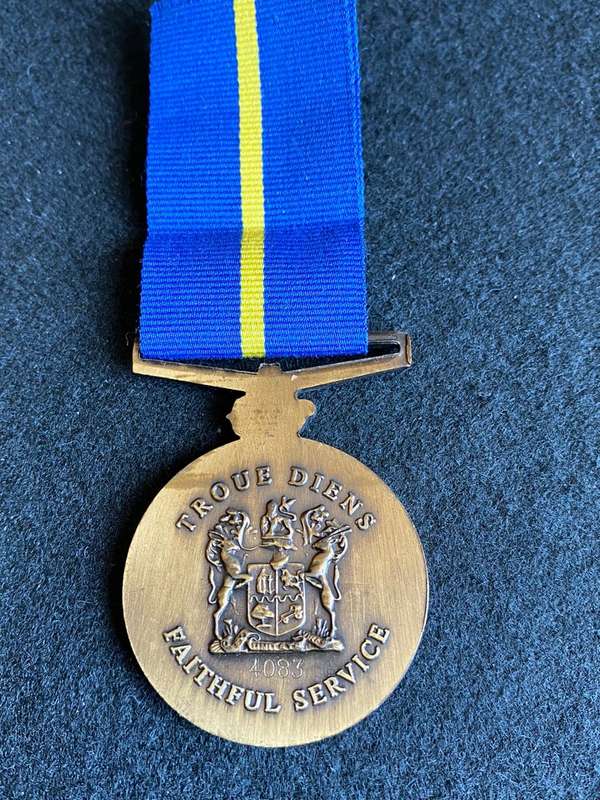 FULL SIZE POLICE 10 YEAR SERVICE MEDAL-NUMBERED