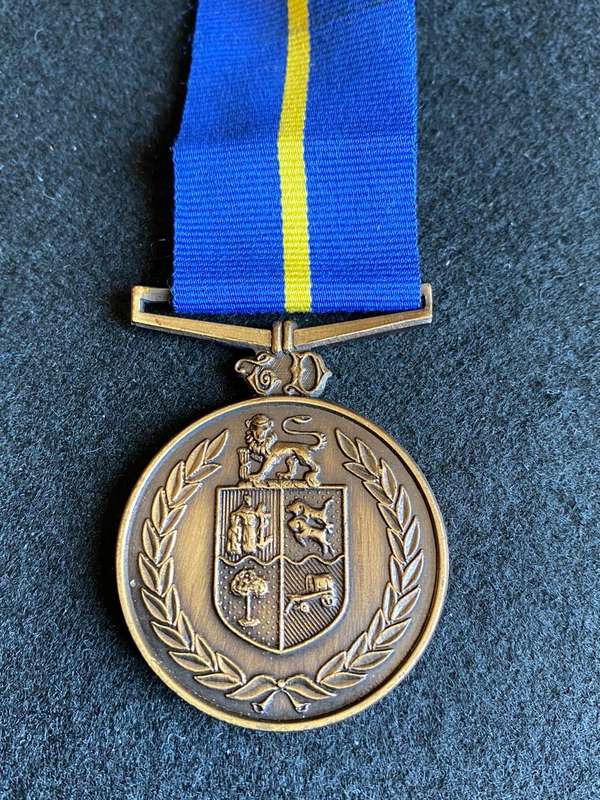 FULL SIZE POLICE 10 YEAR SERVICE MEDAL-NUMBERED