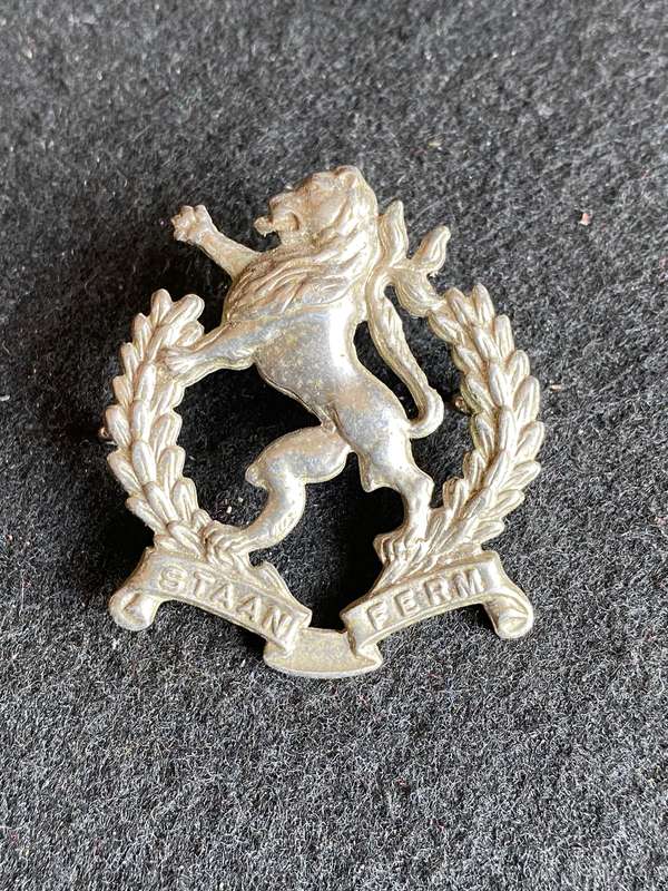REGT. HIGHVELD CAP BADGE-WHITE METAL- 2 LUGS-POST 1976