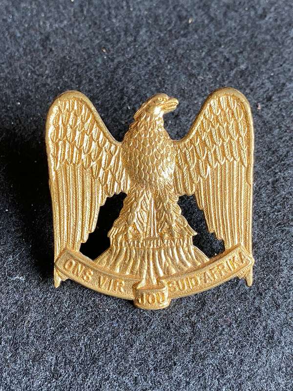 REGT. LOUW WEPENER CAP BADGE,GILT WORN- 1965-76- 2 LUGS