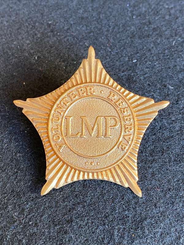 LESOTHO MOUNTED POLICE VOL. RESERVE BRASS CAP BADGE- 2 LUGS