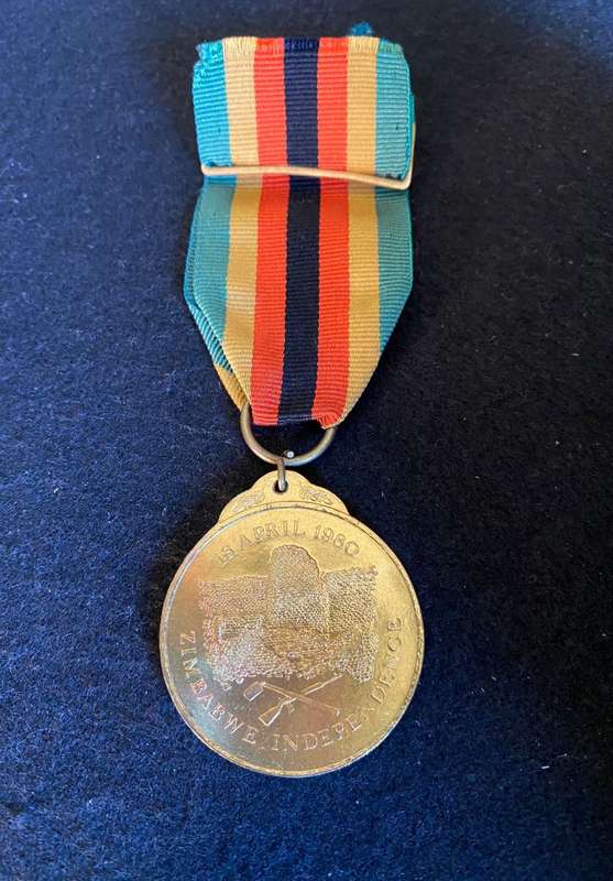 ZIMBZABWE INDEPENDENCE MEDAL-NUMBERED ON THE RIM- 64870- FULL SIZE