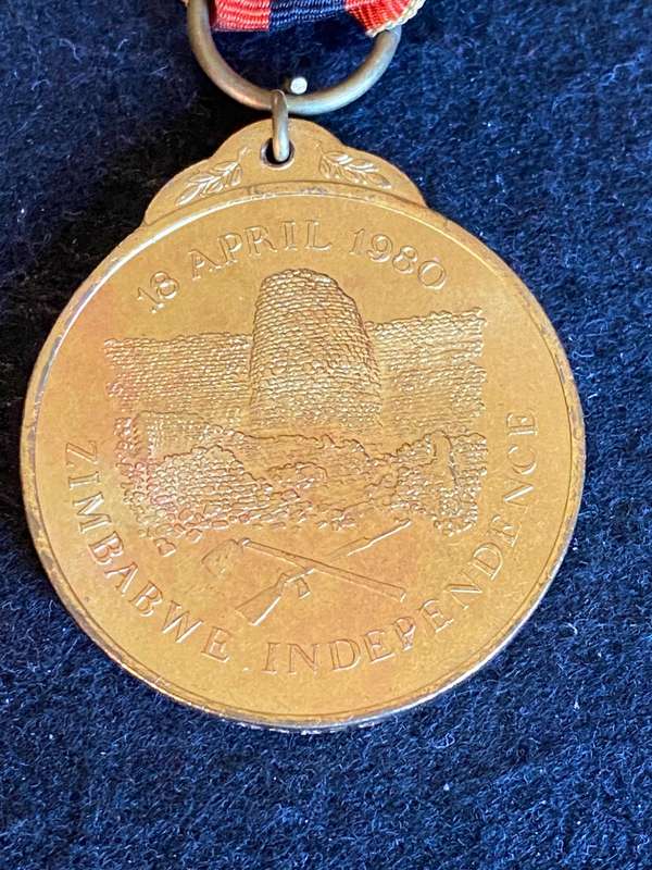 ZIMBZABWE INDEPENDENCE MEDAL-NUMBERED ON THE RIM- 64870- FULL SIZE
