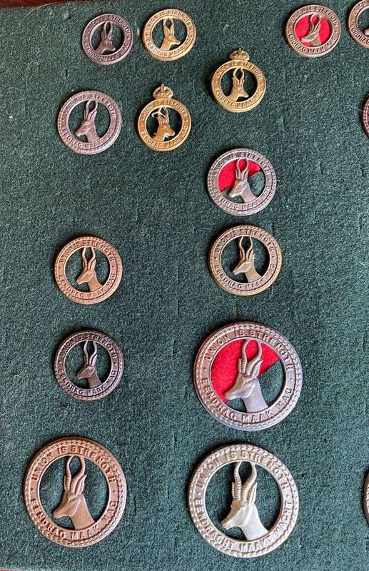 SELECTION OF 18 SA CAP AND COLLAR BADGES- WORN FROM WW1-UNION PERIOD