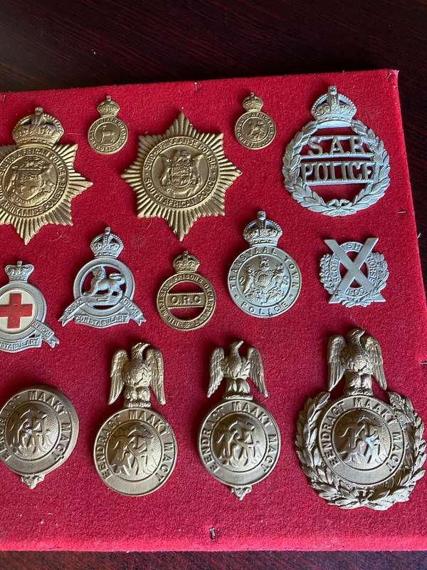 COLLECTION OF 20 CAST (COPY) BADGES