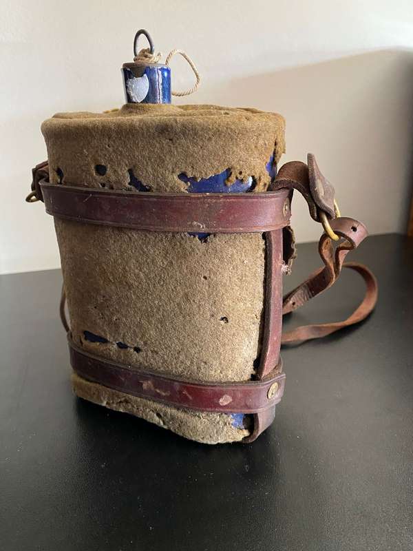 WW1,WATER BOTTLE (BLUE ENAMEL) COMPLETE WITH STOPPER AND LEATHER HARNESS