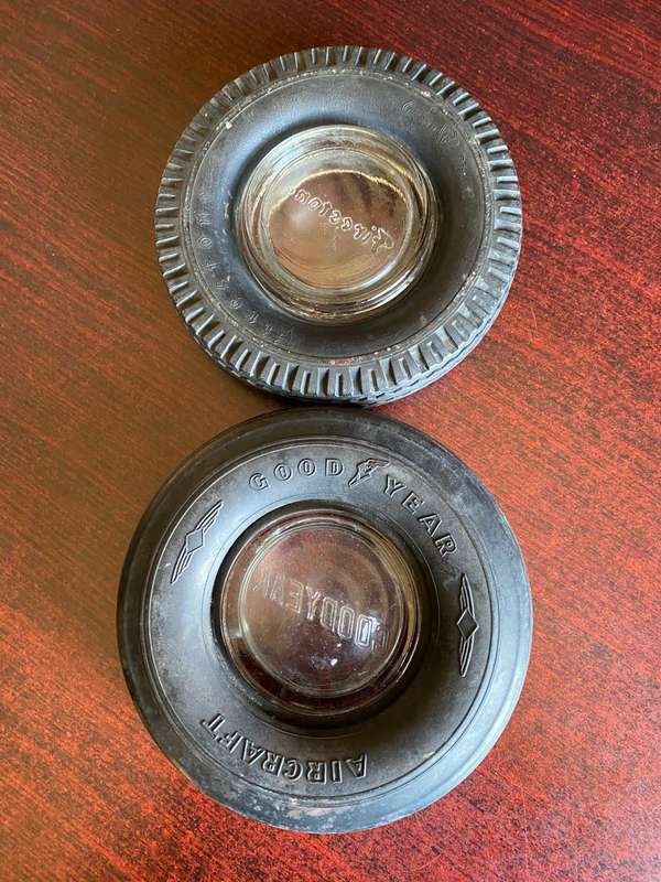 VERY COLLECTABLE 1960'S GOOD YEAR AND FIRESTONE ASHTRAYS-HARD RUBBER WITH GLASS ASHTRAY INSIDE-DIAME