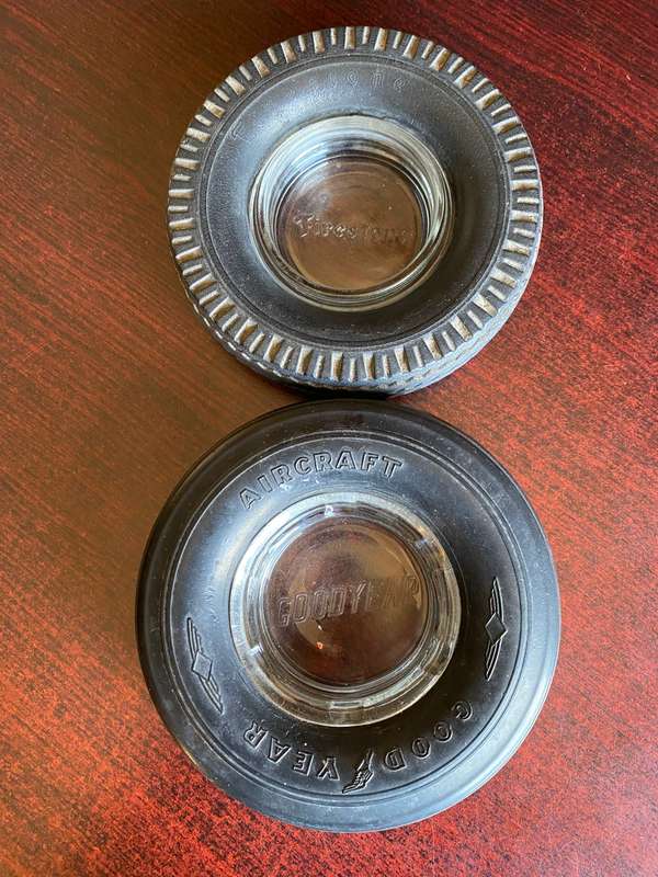 VERY COLLECTABLE 1960'S GOOD YEAR AND FIRESTONE ASHTRAYS-HARD RUBBER WITH GLASS ASHTRAY INSIDE-DIAME