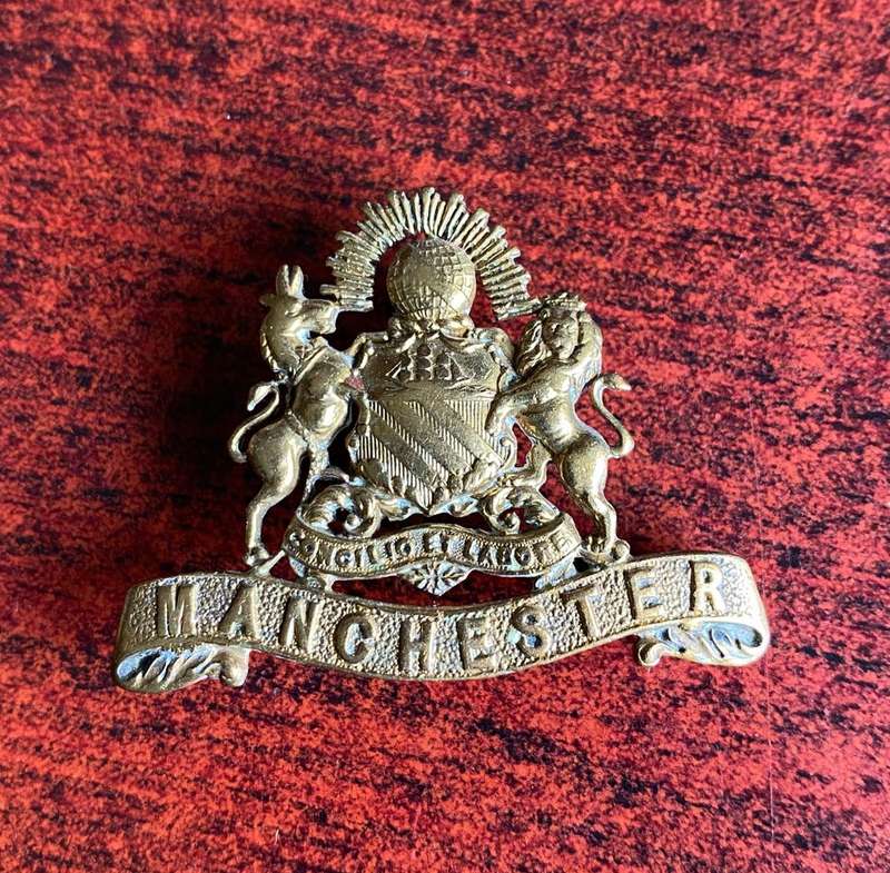 MANCHESTER REGT. CAP BADGE- 3 LUGS
