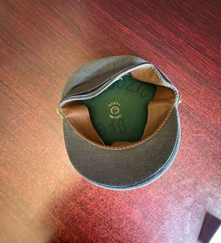 SAAF PEAKED CAP-GOOD CONDITION- MEMBERS MILITARY ID WRITTEN INSIDE