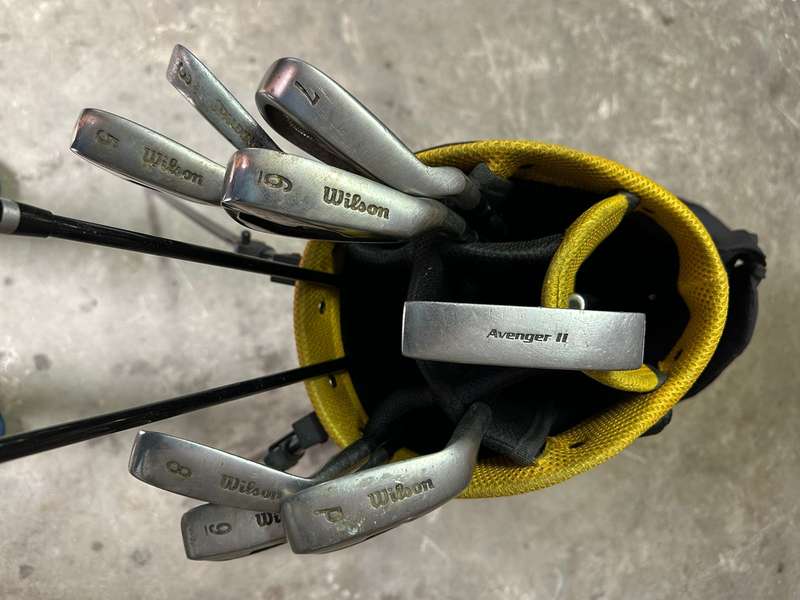 WILSON GOLF SET-STANDING BAG- 2 DRIVERS IRONS- 3 (SPALDING)5,6,7,8,9 AND PITCHING WEDGE-AVENGER 11 P