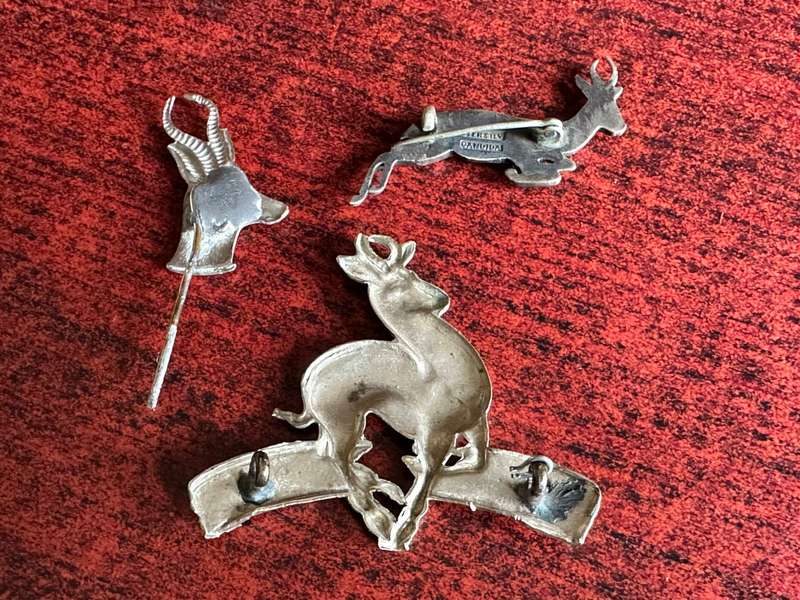SA ARMY BADGES- MIXED LOT OF 3 -THE SPRINGBOK BADGE IS IN STERLING SILVER
