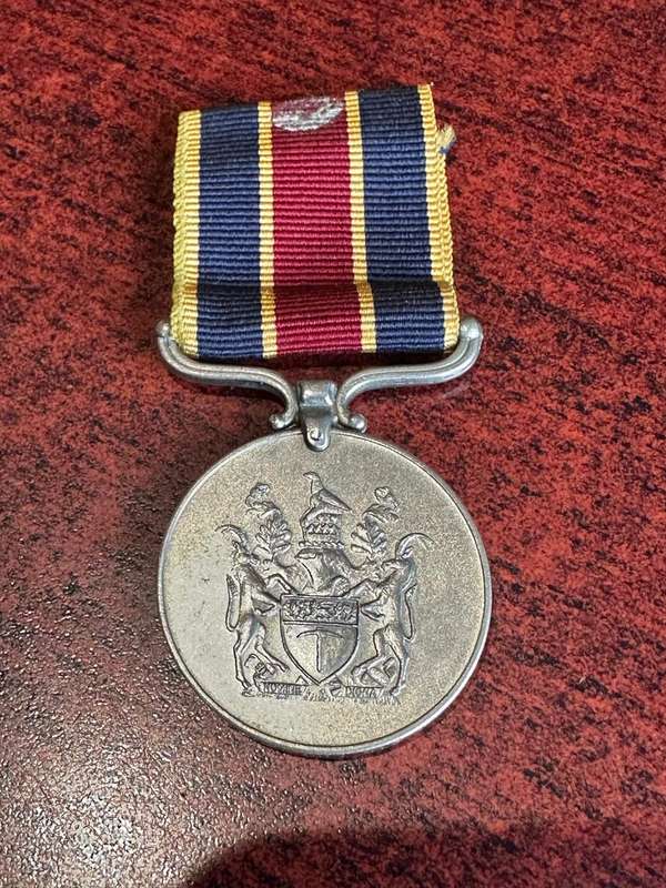 BSAP MEDAL TO 27770 J. STICK LEADER D.B. BEZUIDENHOUT- THE MEDAL IS UNRESEARCHED-RIBBON NOT CORRECT