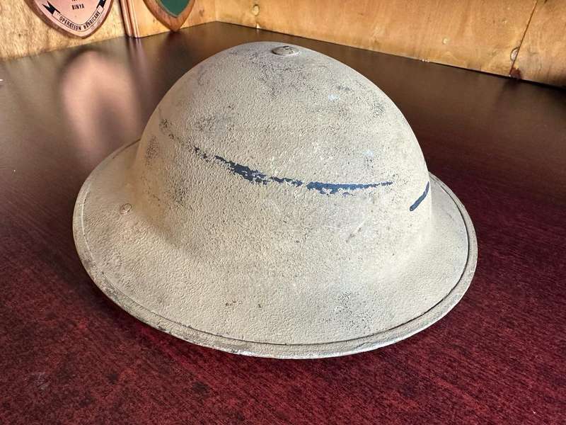 WW2 SA BORDER HELMET-USED IN NORTH AFRICA-3 HOLES IN THE BACK FOR NECK FLAP-PAINTED DESERT CAMO-GOOD