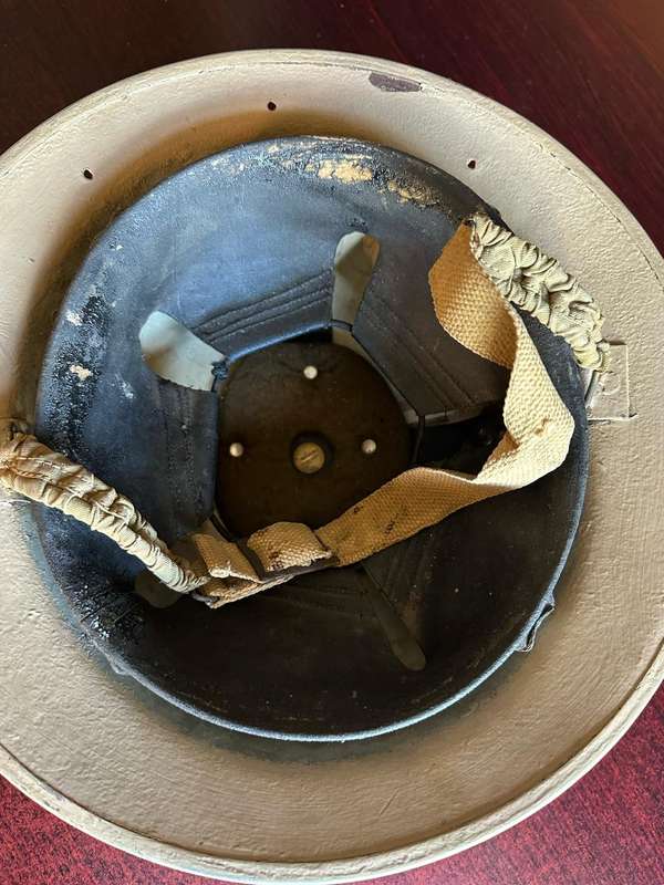 WW2 SA BRODIE HELMET-USED IN NORTH AFRICA-3 HOLES IN THE BACK FOR NECK FLAP-PAINTED DESERT CAMO-GOOD