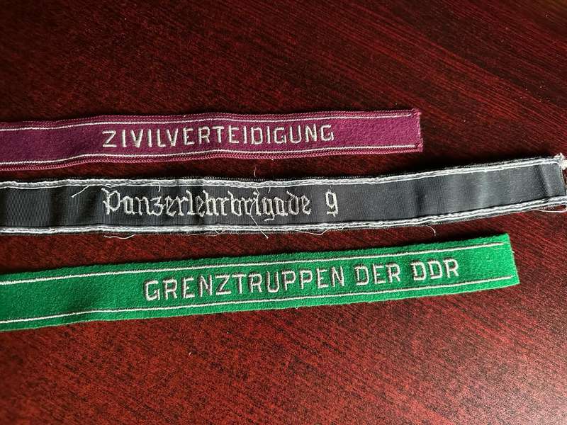 MIXED LOT OF GERMAN CUFF TITLES FOR CIVIL DEFENCE,PANZERBRIGADE 9 AND BORDER GUARDS