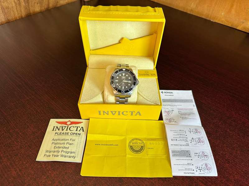 INVICTA MENS,SPECIALTY QUARTS CHRONOGRAPH,MODEL NO 80303-MODEL YEAR 2013-CASE METERIAL STAINLESS STE