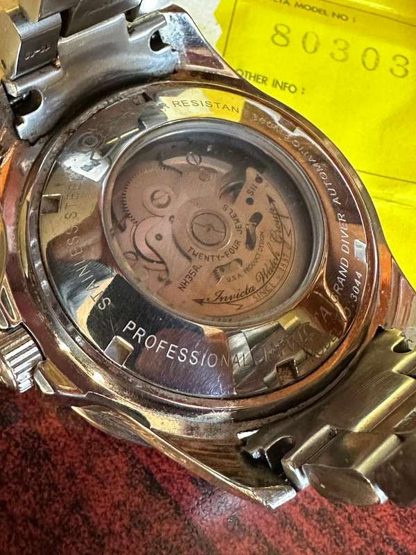 INVICTA MENS,SPECIALTY QUARTS CHRONOGRAPH,MODEL NO 80303-MODEL YEAR 2013-CASE METERIAL STAINLESS STE
