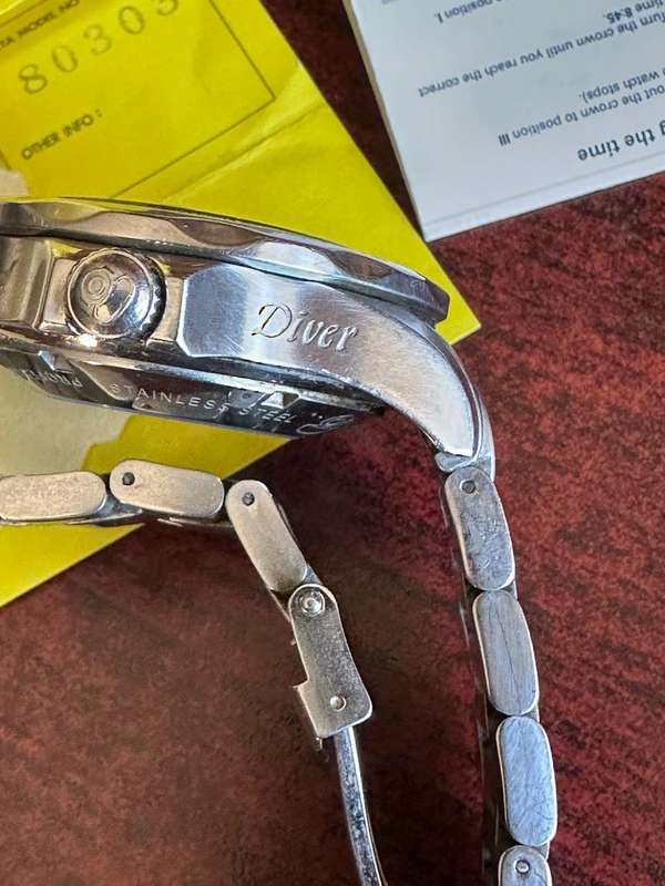 INVICTA MENS,SPECIALTY QUARTS CHRONOGRAPH,MODEL NO 80303-MODEL YEAR 2013-CASE METERIAL STAINLESS STE