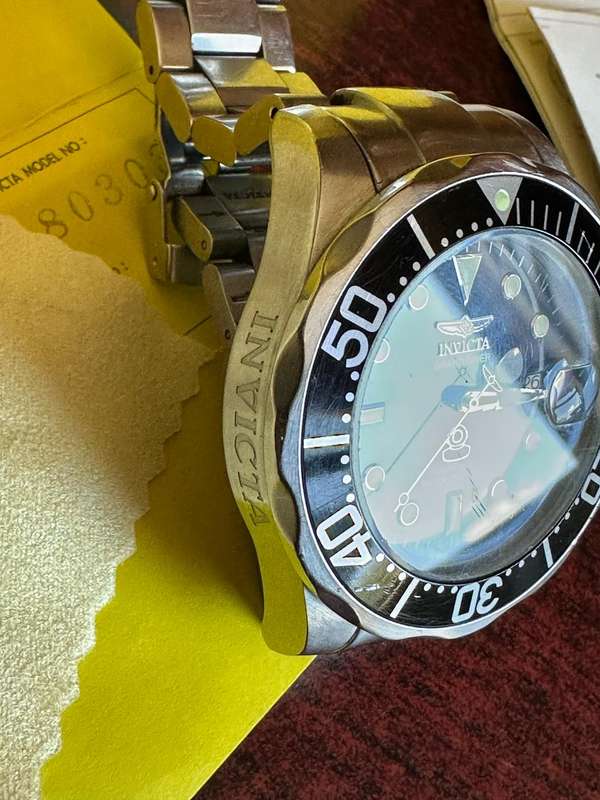 INVICTA MENS,SPECIALTY QUARTS CHRONOGRAPH,MODEL NO 80303-MODEL YEAR 2013-CASE METERIAL STAINLESS STE