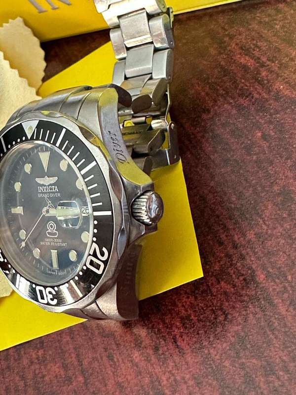 INVICTA MENS,SPECIALTY QUARTS CHRONOGRAPH,MODEL NO 80303-MODEL YEAR 2013-CASE METERIAL STAINLESS STE