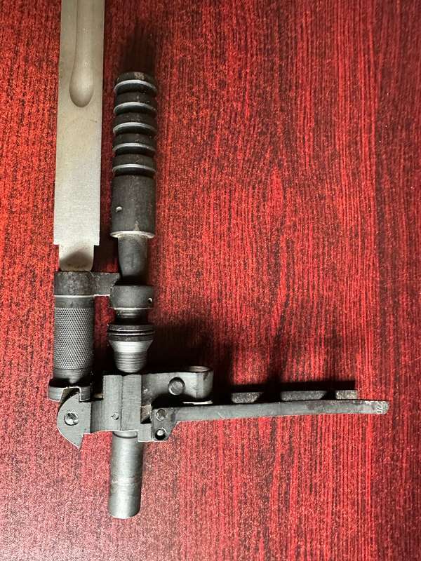 RUSSIAN S.G. SIMONOV DESIGNED THE SKS 45 RIFLE,WHICH INCLUDED A VERY DISTINCTIVE KNIFE BAYONET- THE