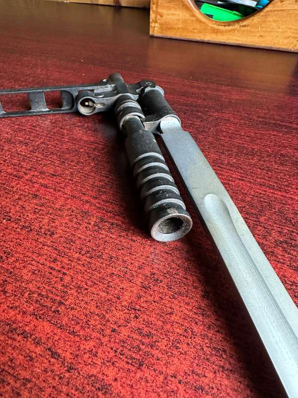 RUSSIAN S.G. SIMONOV DESIGNED THE SKS 45 RIFLE,WHICH INCLUDED A VERY DISTINCTIVE KNIFE BAYONET- THE