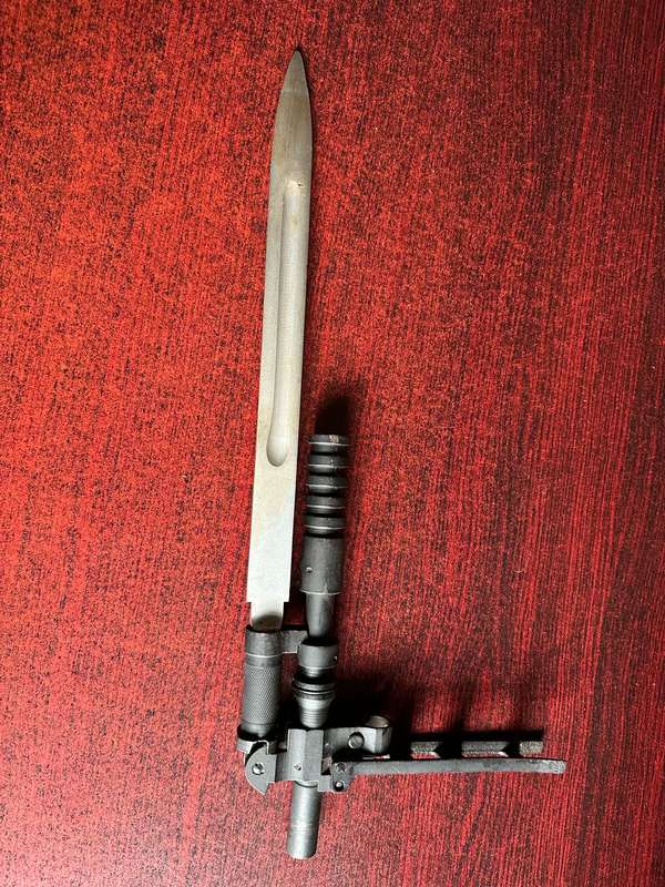 RUSSIAN S.G. SIMONOV DESIGNED THE SKS 45 RIFLE,WHICH INCLUDED A VERY DISTINCTIVE KNIFE BAYONET- THE