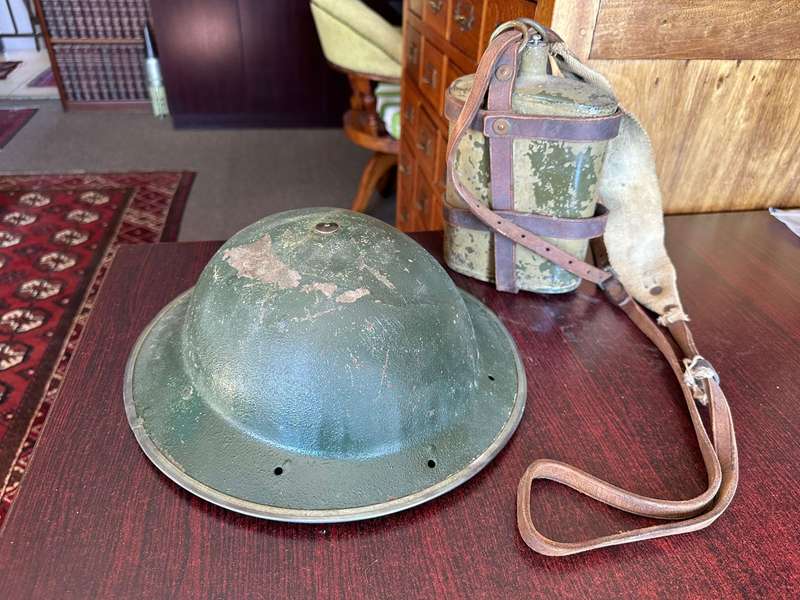 BRITISH WW2 MARK 2 STEEL HELMET WITH WW2 WATER BOTTLE-THE BOTTLE IS COMPLETE WITH STOPPER AND LEATHE