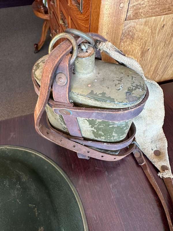 BRITISH WW2 MARK 2 STEEL HELMET WITH WW2 WATER BOTTLE-THE BOTTLE IS COMPLETE WITH STOPPER AND LEATHE