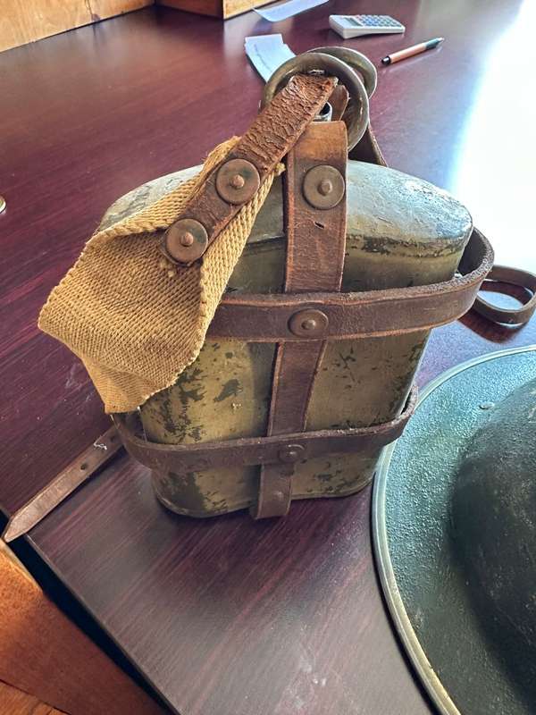 BRITISH WW2 MARK 2 STEEL HELMET WITH WW2 WATER BOTTLE-THE BOTTLE IS COMPLETE WITH STOPPER AND LEATHE