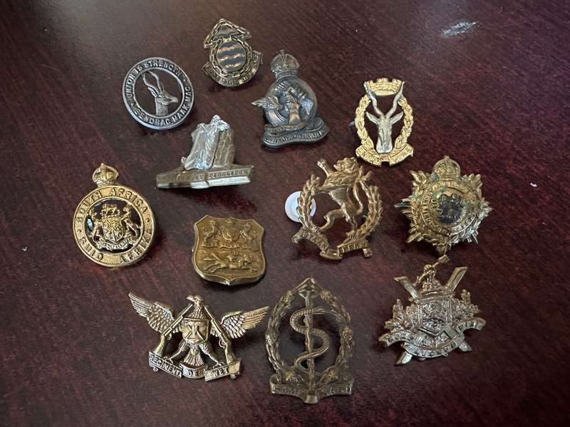 Selection of 12 brass collars. Sold together. One missing pin.