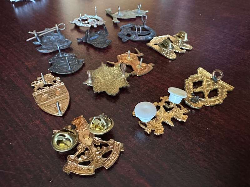 Selection of 13 brass collar badges. Sold together. One lug missing