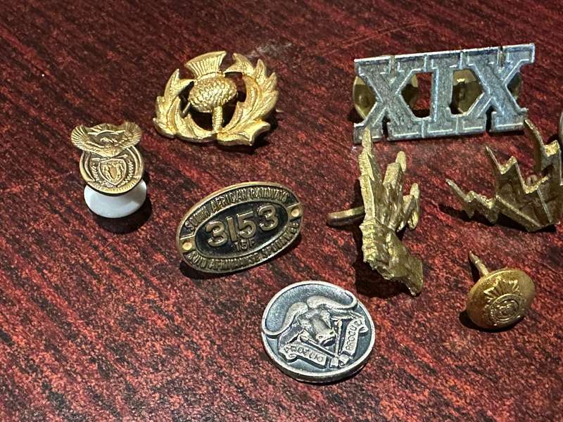 Mixed pin badges 11 in total.